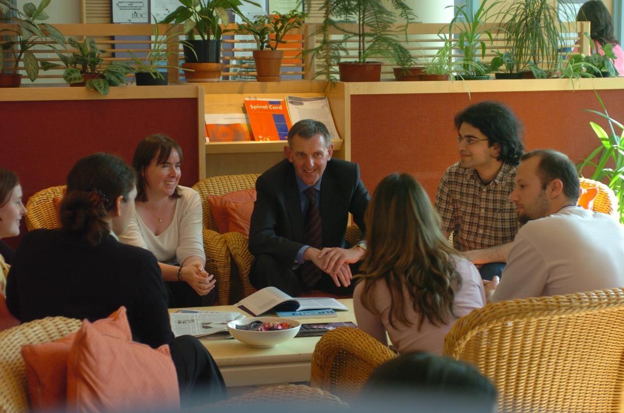 People discussing round a table